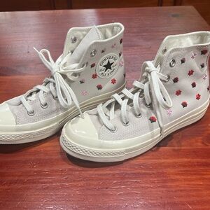 Brand new Converse Women’s 7.5 high top embroidered Chuck Taylors.